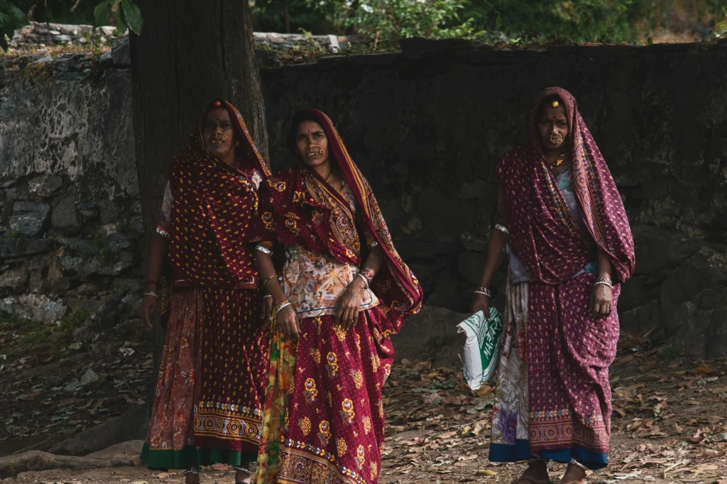 Traditional North Indian style sarees worn by women showcasing cultural elegance.