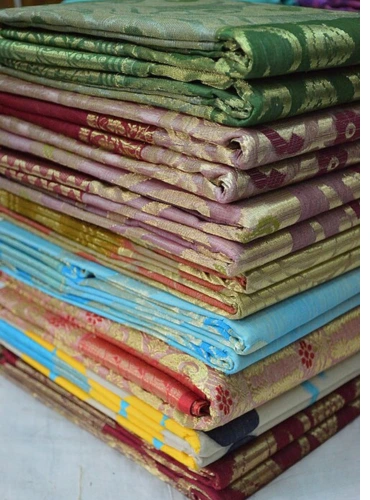 Tussar silk sarees with natural texture and elegant woven patterns.